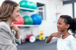 Speech Language Pathologist working with child